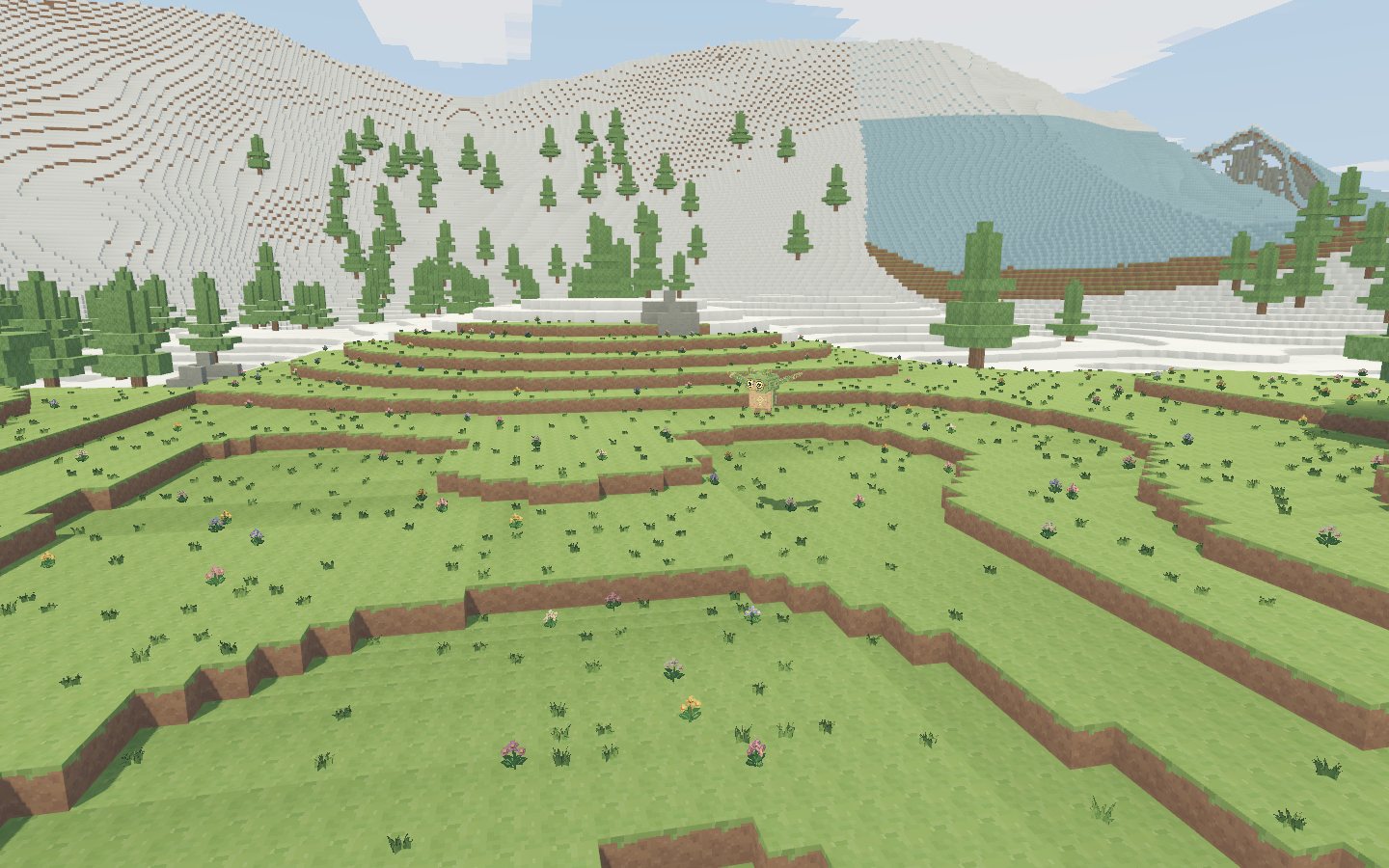 Dry grass plains beneath the mountain.