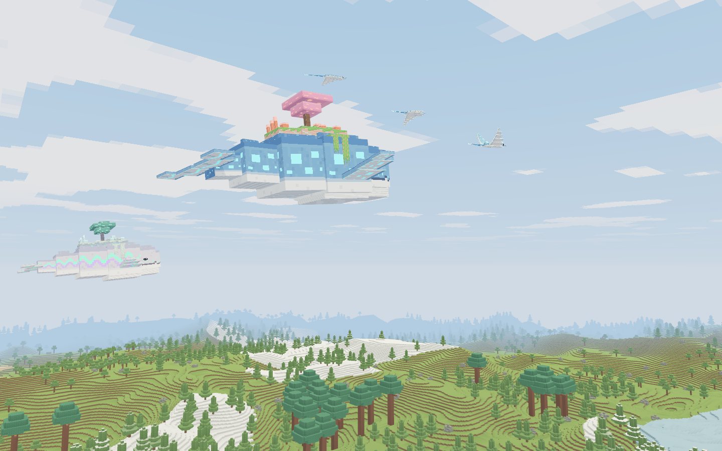 Driftwhales over the meadow, snow terraces behind.